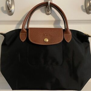Longchamp Le Pliage mini.  Black with brown leather
